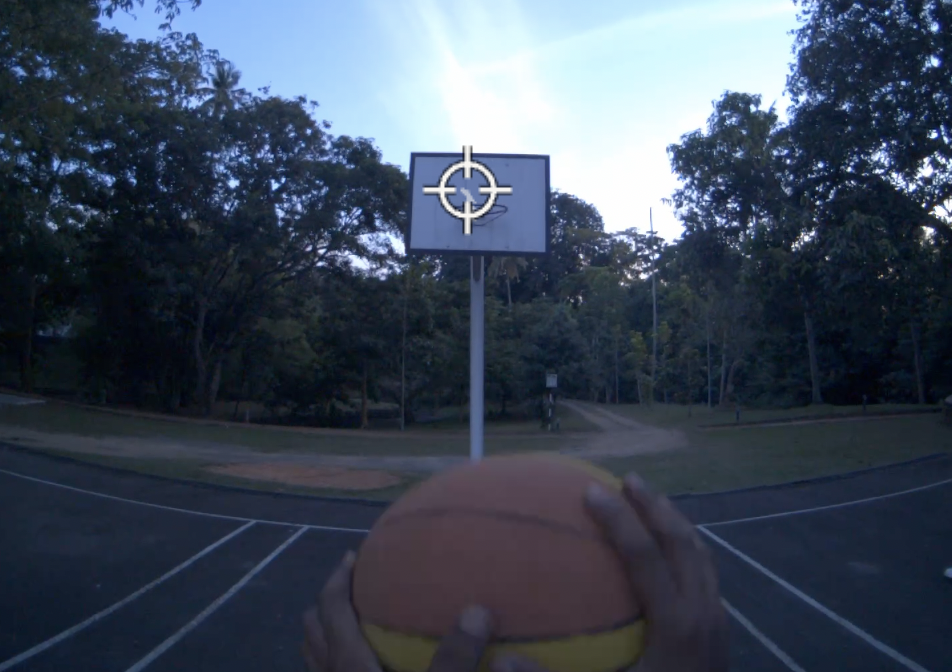 The view through Shootbuddy's smart glasses: a gaze crosshair locked on the backboard as a shooter lines up the ball